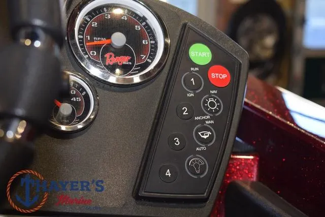 Slide: The Image of Control panel of 2017 Ranger Z521C boat with gauges and start/stop buttons. - 21