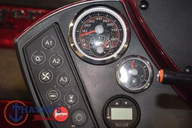 Slide: The Image of Dashboard of a 2017 Ranger Z521C boat with gauges and control panel. - 22