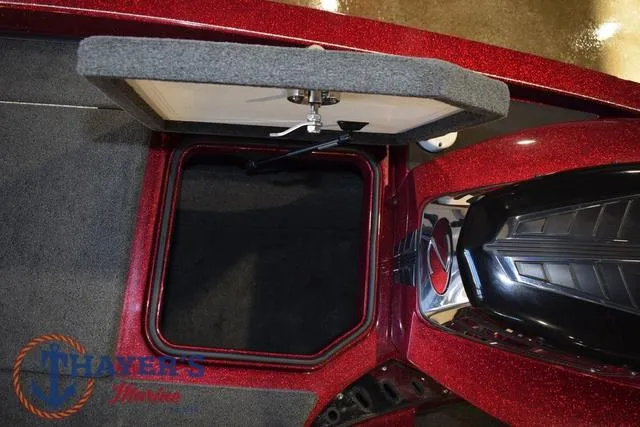 Slide: The Image of 2017 Ranger Z521C boat storage compartment with open lid, showcasing interior space. - 32