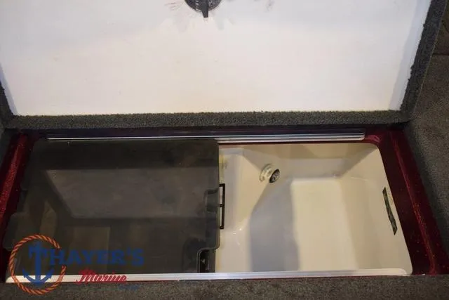 Slide: The Image of 2017 Ranger Z521C storage compartment with open lid, showcasing interior space. - 36