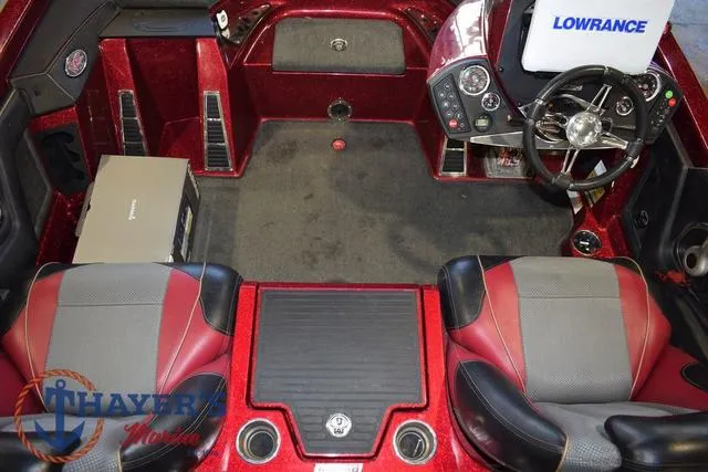 Slide: The Image of 2017 Ranger Z521C boat interior with red accents and Lowrance electronics. - 42