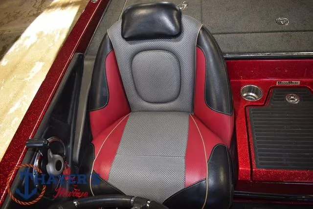 Slide: The Image of 2017 Ranger Z521C boat seat with red and gray upholstery, featuring a sleek design. - 44