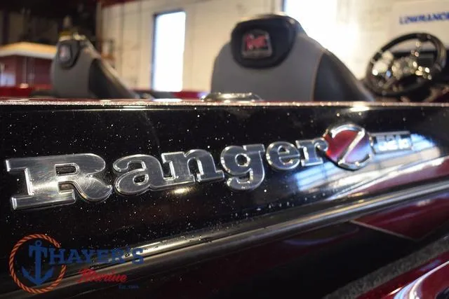 Slide: The Image of 2017 Ranger Z521C boat interior with logo and seating detail. - 7