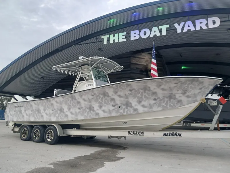 Slide: The Image of 2001 Regulator 32 boat on trailer at The Boat Yard. - 18