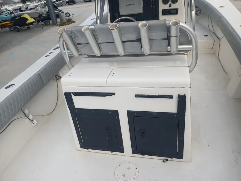 Slide: The Image of 2001 Regulator 32 boat interior with rod holders and storage compartments. - 9