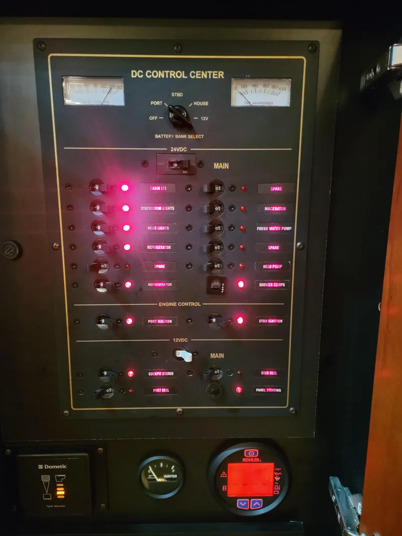 Slide: The Image of DC control center panel on a 2011 Rampage 41 Express boat. - 21