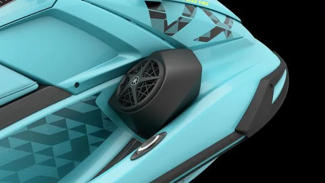 Slide: The Image of 2025 Yamaha Waverunner VX Limited HO, turquoise design with speaker detail. - 11
