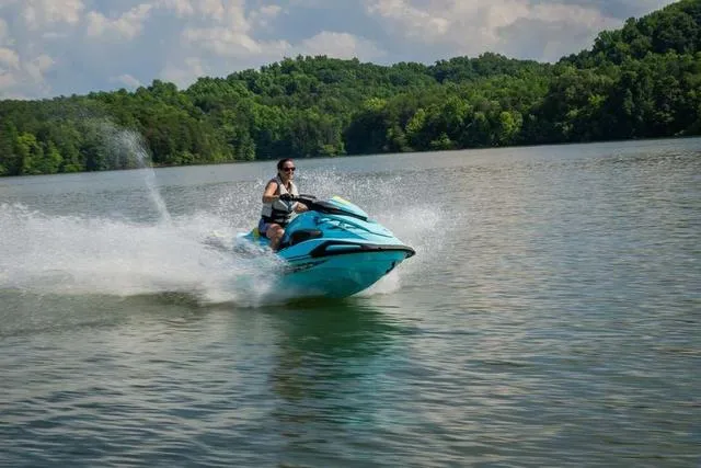 Slide: The Image of Person riding 2025 Yamaha Waverunner VX Limited HO on a scenic lake. - 20