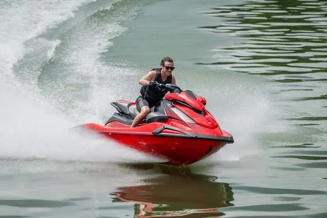 Slide: The Image of 2025 Yamaha Waverunner VX in action on water, red jet ski. - 19