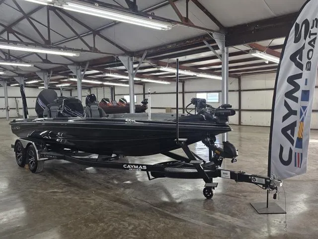 Slide: The Image of 2025 Caymas CX21 Pro fishing boat, top view, showcasing storage compartments and seating arrangement. - 1