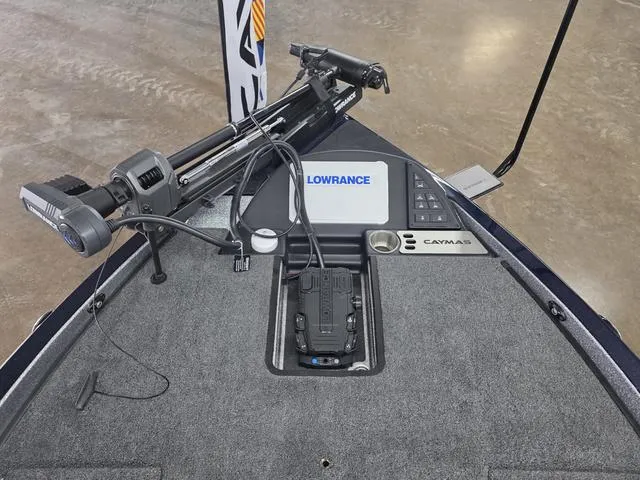 Slide: The Image of 2025 Caymas CX21 Pro boat deck with Lowrance electronics and trolling motor. - 10