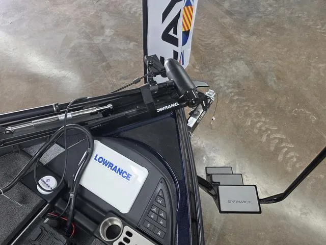 Slide: The Image of 2025 Caymas CX21 Pro boat with Lowrance electronics and trolling motor on display. - 11