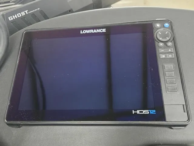 Slide: The Image of Lowrance HDS12 fishfinder on 2025 Caymas CX21 Pro boat dashboard. - 12