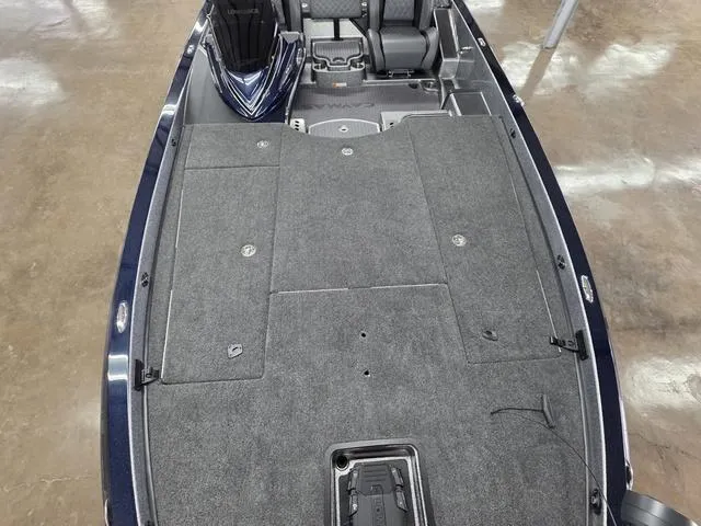 Slide: The Image of 2025 Caymas CX21 Pro boat interior with spacious deck and seating. - 16