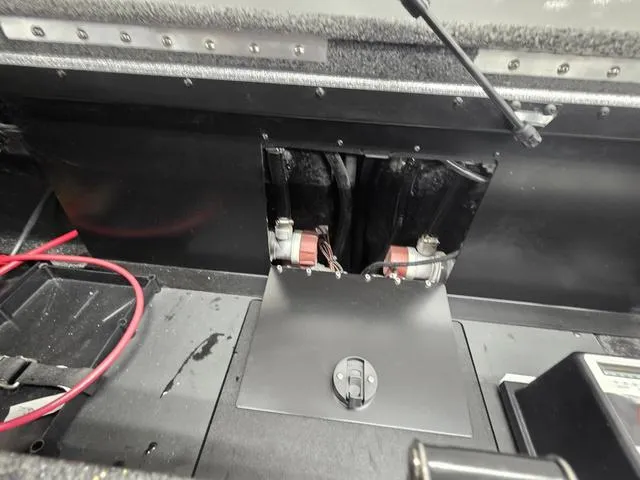 Slide: The Image of Interior view of 2025 Caymas CX21 Pro boat showing wiring and components. - 24