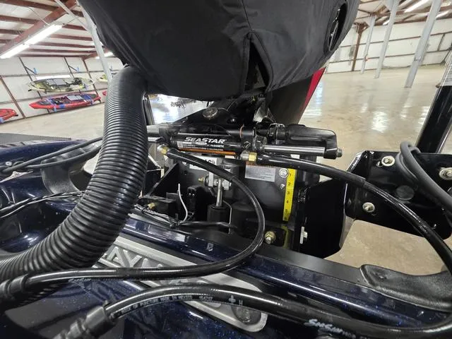 Slide: The Image of 2025 Caymas CX21 Pro boat engine with SeaStar hydraulic steering system. - 26