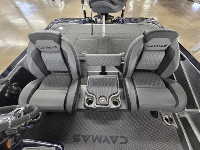 Slide: The Image of 2025 Caymas CX21 Pro boat interior with dual seats and center console. - 32