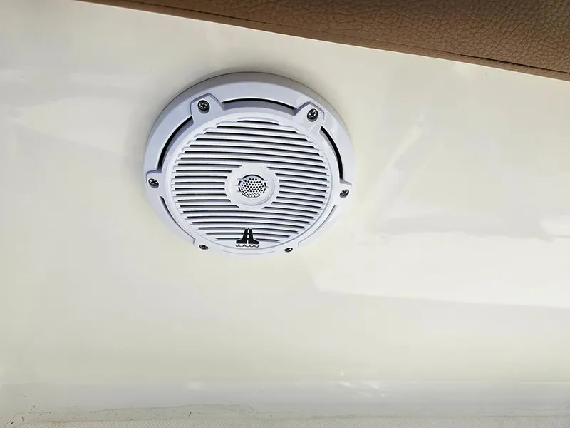 Slide: The Image of White speaker on 2025 Pioneer 222 Sportfish boat interior. - 26
