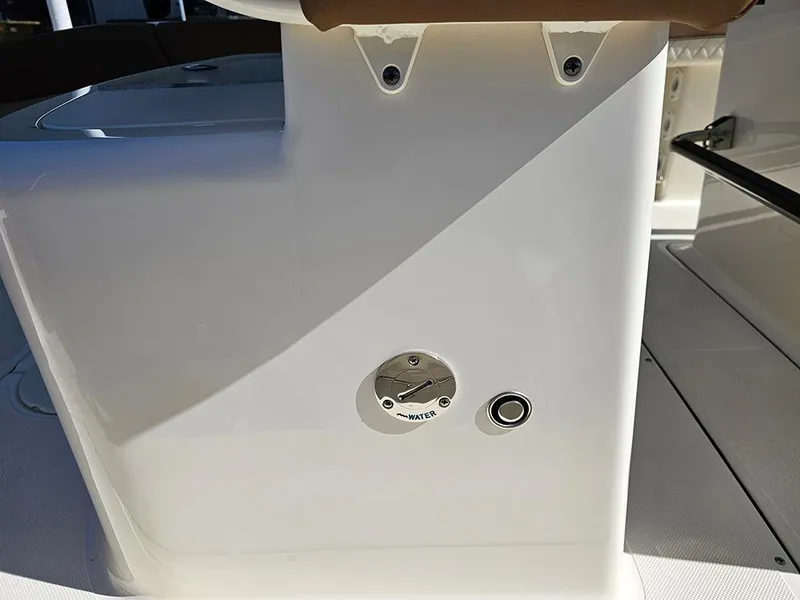 Slide: The Image of 2025 Pioneer 222 Sportfish boat detail, featuring a water access point on the deck. - 38