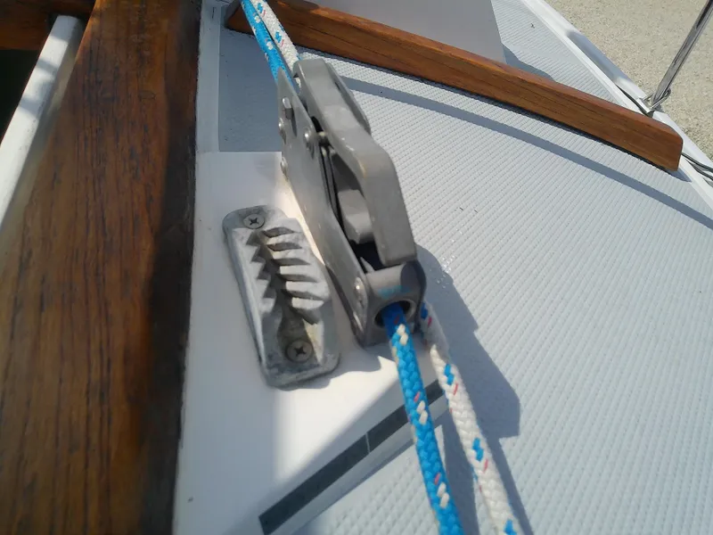Slide: The Image of Close-up of a Catalina 30 MkII sailboat's cleat and rope, 1990 model. - 23