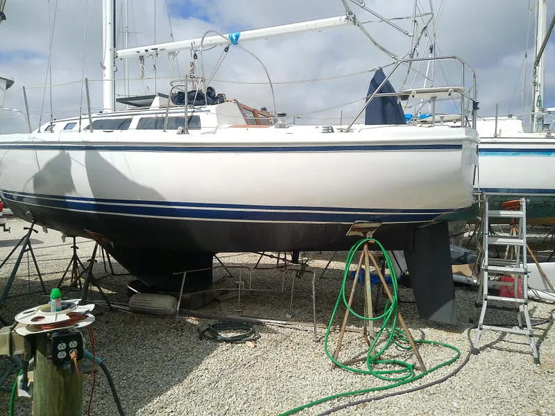 Slide: The Image of 1990 Catalina 30 MkII sailboat on dry dock, ready for maintenance. - 4