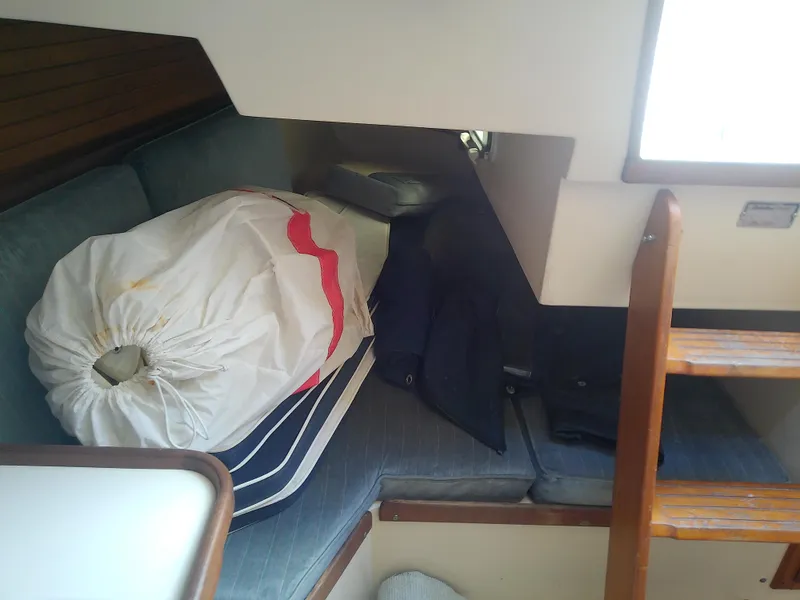 Slide: The Image of Interior of 1990 Catalina 30 MkII sailboat with cushions and storage bag. - 46
