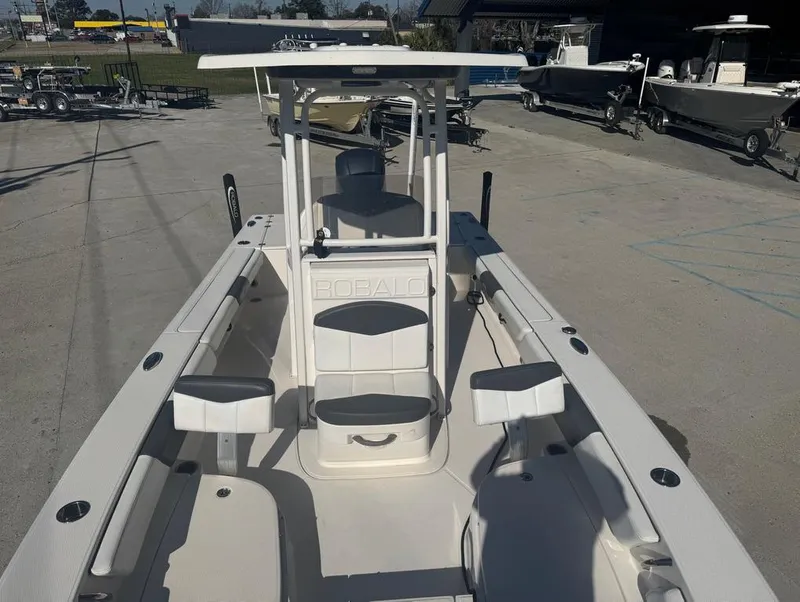 Slide: The Image of 2018 Robalo 246 Cayman boat, center console, white interior, outdoor display. - 19