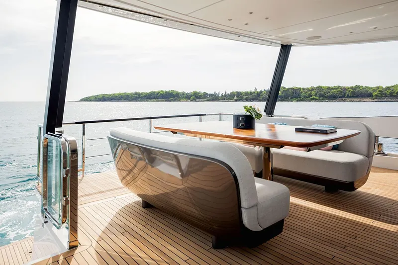 Slide: The Image of Luxury deck seating on 2025 Azimut Grande 26M yacht with ocean view. - 16