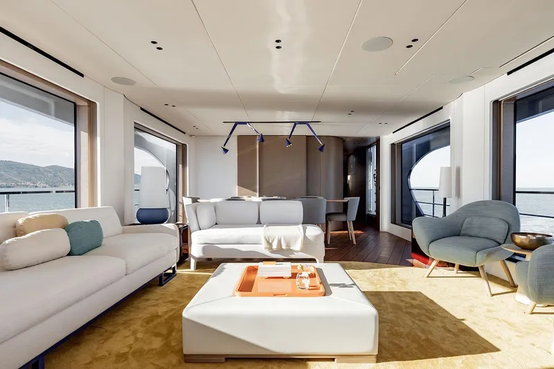 Slide: The Image of Luxurious interior of 2025 Azimut Grande 26M yacht with modern furnishings and large windows. - 18