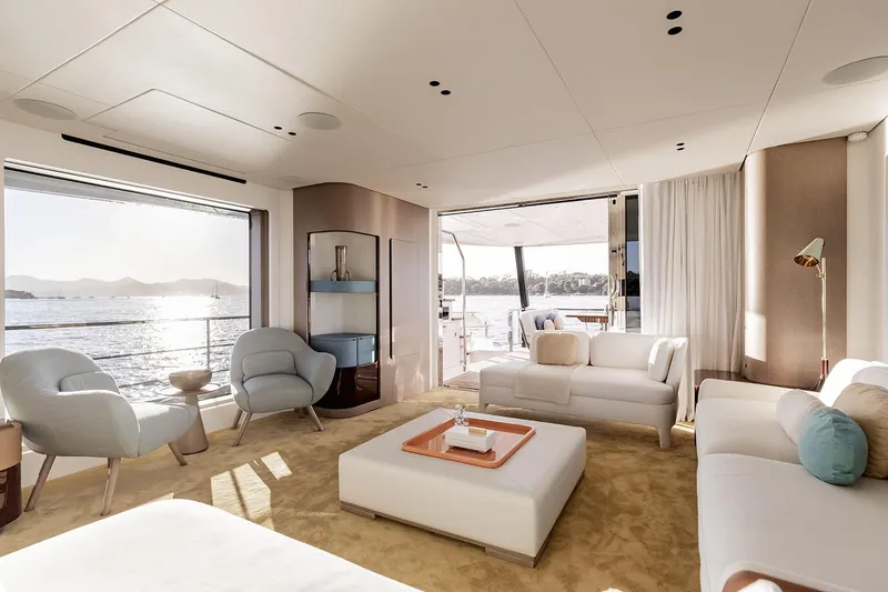 Slide: The Image of Luxurious interior of 2025 Azimut Grande 26M yacht with elegant seating and ocean view. - 20