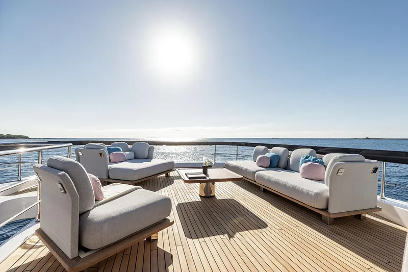 Slide: The Image of Luxurious deck of 2025 Azimut Grande 26M yacht with elegant seating and ocean view. - 42