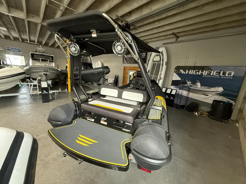 Slide: The Image of 2025 Highfield Velox 420 boat in showroom, featuring sleek design and modern equipment. - 6