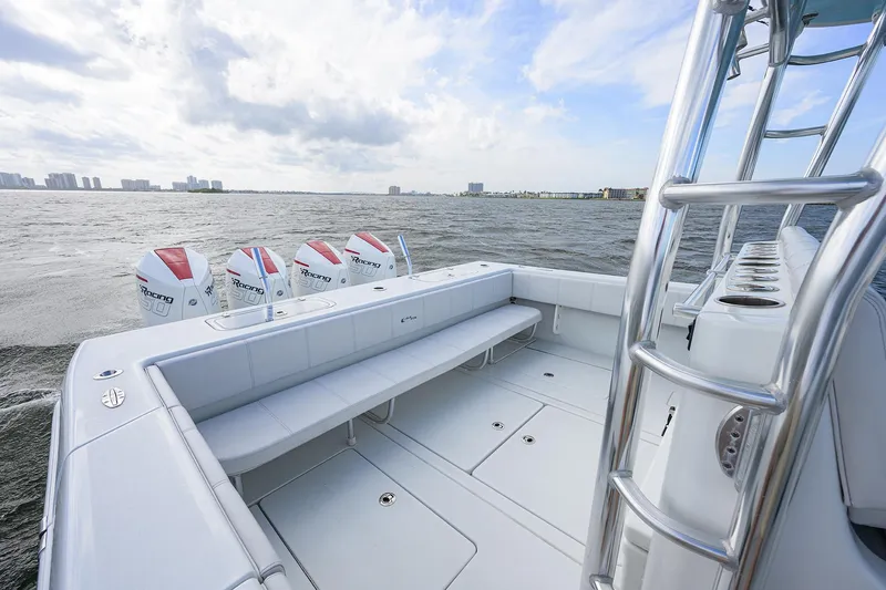 Slide: The Image of Contender 44FA 2022 boat with triple engines on open water. - 26