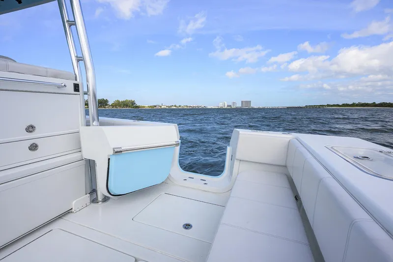 Slide: The Image of 2022 Contender 44FA boat interior with ocean view and clear blue sky. - 33