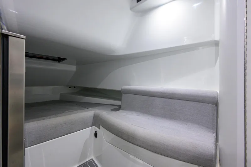 Slide: The Image of Interior cabin of 2022 Contender 44FA boat with gray seating. - 43
