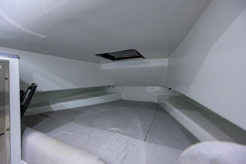 Slide: The Image of Interior cabin of 2022 Contender 44FA boat, featuring a spacious sleeping area. - 44