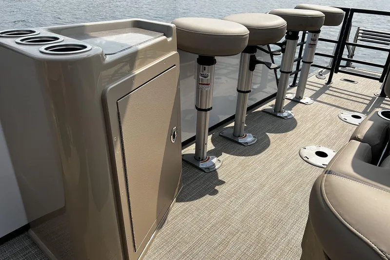 Slide: The Image of 2023 Sylvan L5 DLZ Bar pontoon boat with bar stools and storage cabinet. - 36