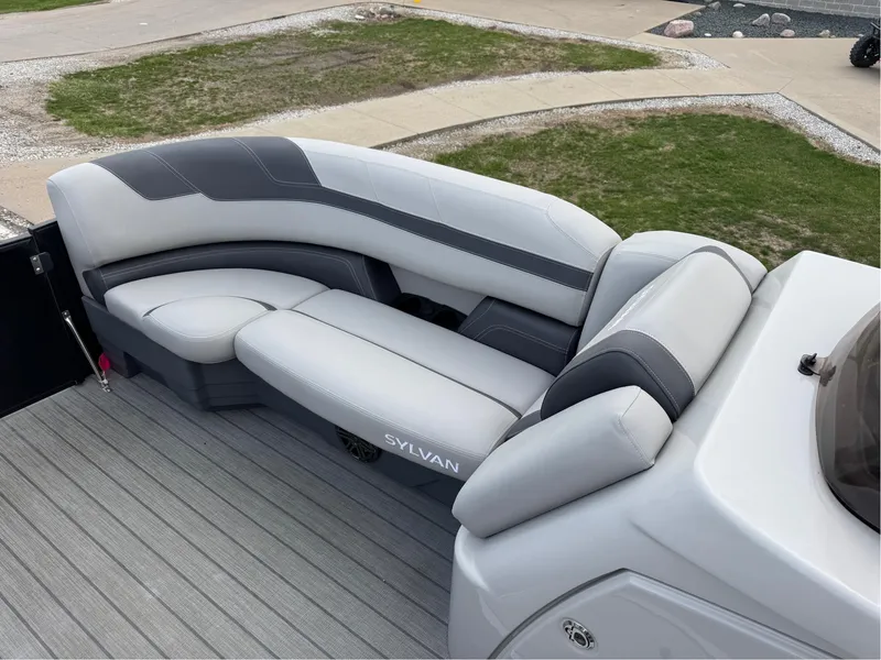 Slide: The Image of 2023 Sylvan L5 DLZ Bar boat with sleek gray seating. - 5