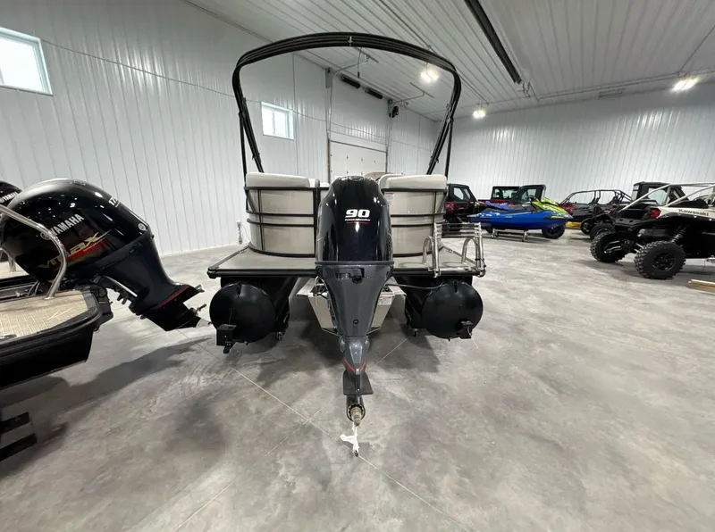 Slide: The Image of 2024 Sylvan MIRAGE 820 LZ pontoon boat with Yamaha outboard motor in showroom. - 3