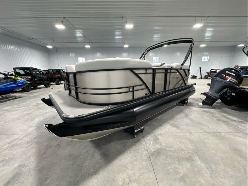Slide: The Image of 2024 Sylvan MIRAGE 820 LZ pontoon boat in a showroom, side view. - 8