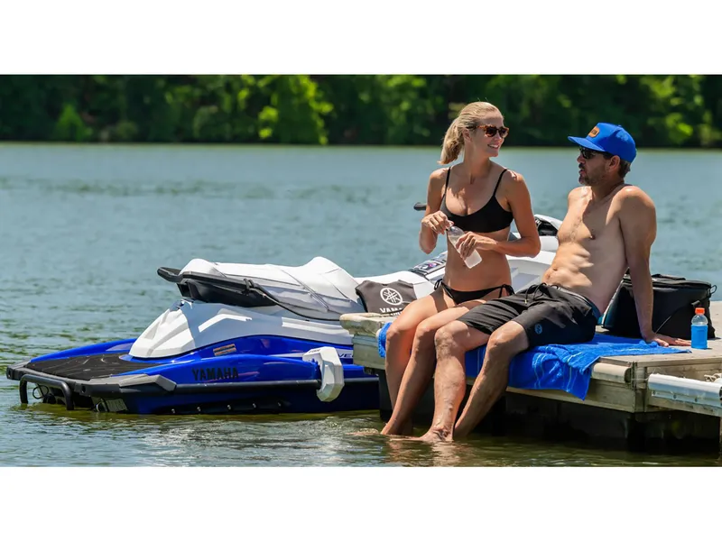 Slide: The Image of Couple relaxing by a 2025 Yamaha GP SVHO jet ski on a sunny day. - 10
