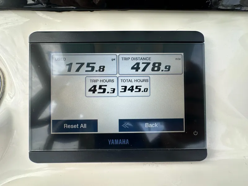 Slide: The Image of Yamaha display showing fuel used, trip distance, and hours for Pathfinder 2500 Hybrid 2021. - 14