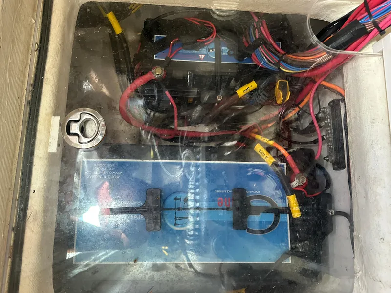Slide: The Image of 2021 Pathfinder 2500 Hybrid battery compartment with wiring and components visible. - 26