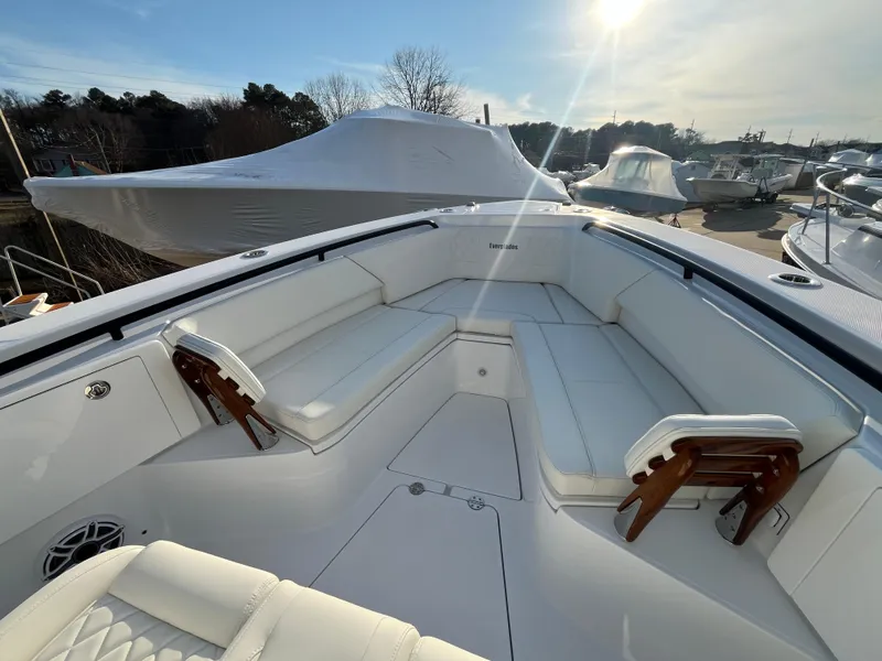 Slide: The Image of 2025 Everglades 335 Center Console boat with spacious seating and sleek design. - 10