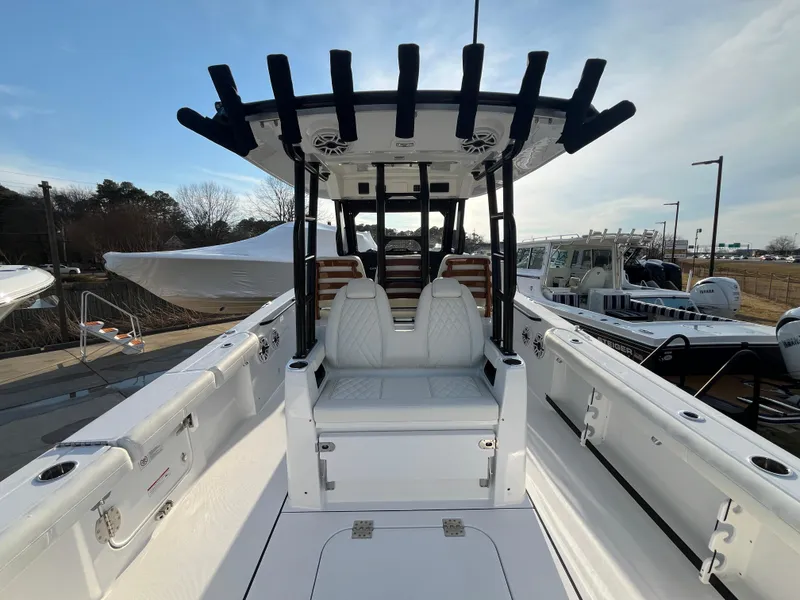 Slide: The Image of 2025 Everglades 335 Center Console boat with sleek design and spacious seating. - 3