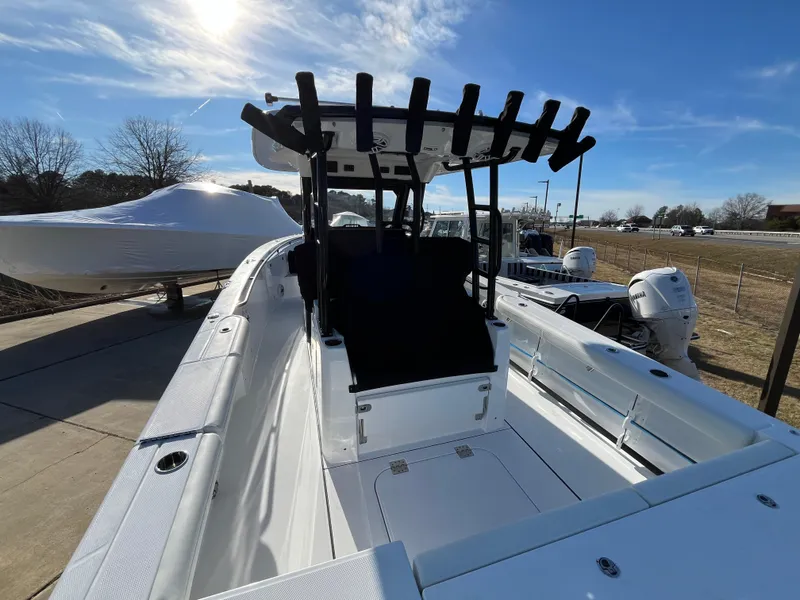 Slide: The Image of 2025 Everglades 335 Center Console boat with sleek design and spacious deck. - 4