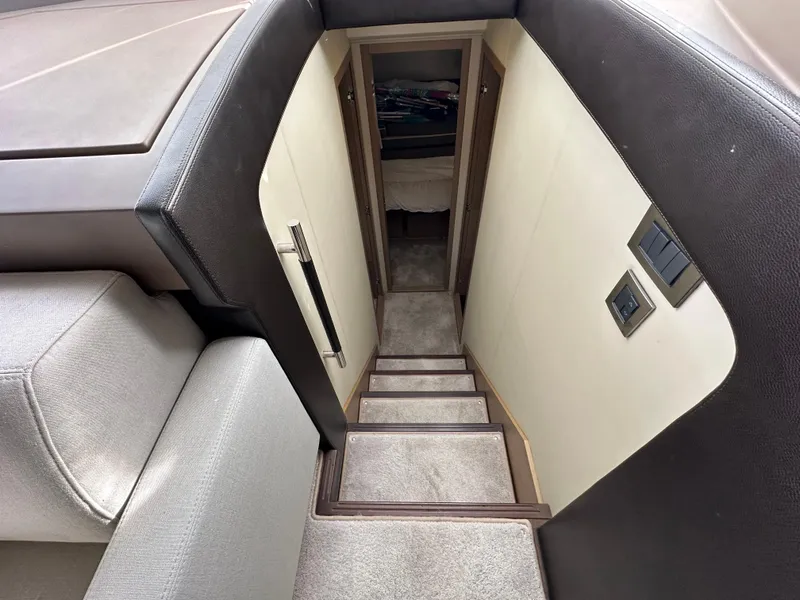Slide: The Image of Staircase leading to lower cabin in 2017 Prestige 500 yacht interior. - 14