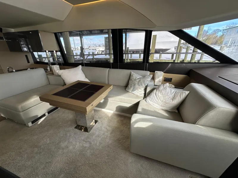 Slide: The Image of Luxurious interior of a 2017 Prestige 500 yacht with elegant seating and table. - 7