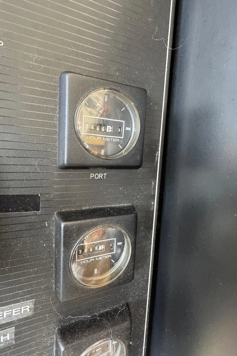 Slide: The Image of Close-up of 1996 Bayliner 4788 Pilothouse control panel with gauges. - 33