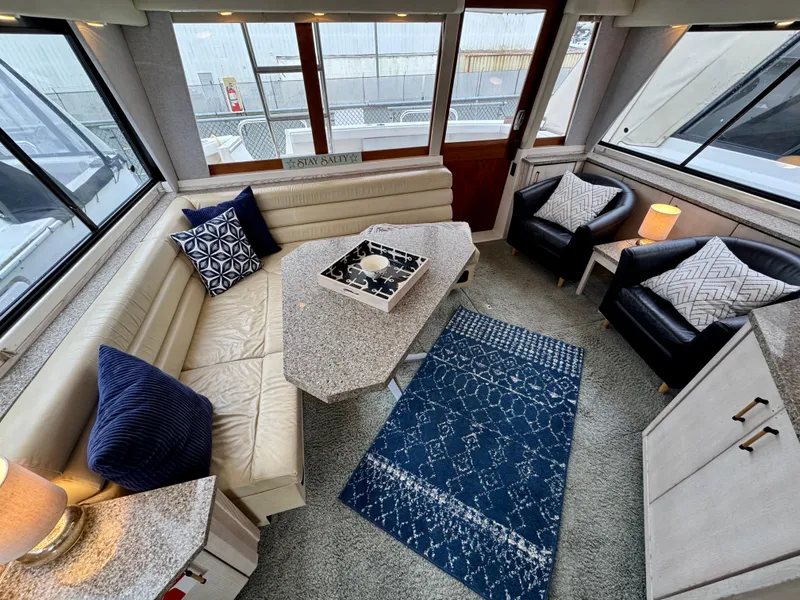 Slide: The Image of Luxurious interior of 1996 Bayliner 4788 Pilothouse with elegant seating and decor. - 8